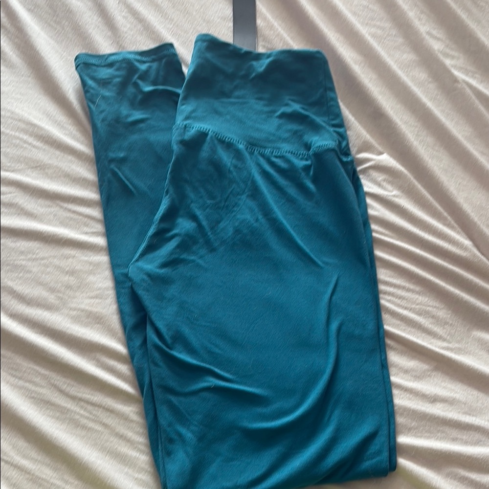 NWT Teal leggings. Size OS